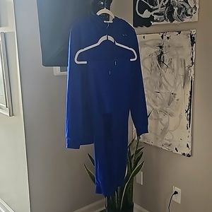 Royal blue distress track suit.